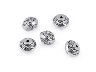 Kovový korálek disk ornament 7x9 mm 